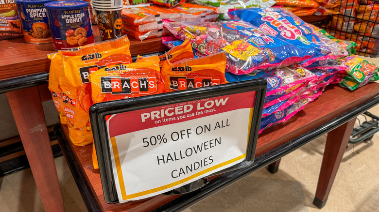 A pile of discounted Halloween candy at a grocery store
