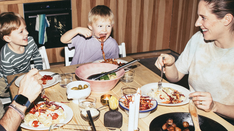 A family enjoys dinner together