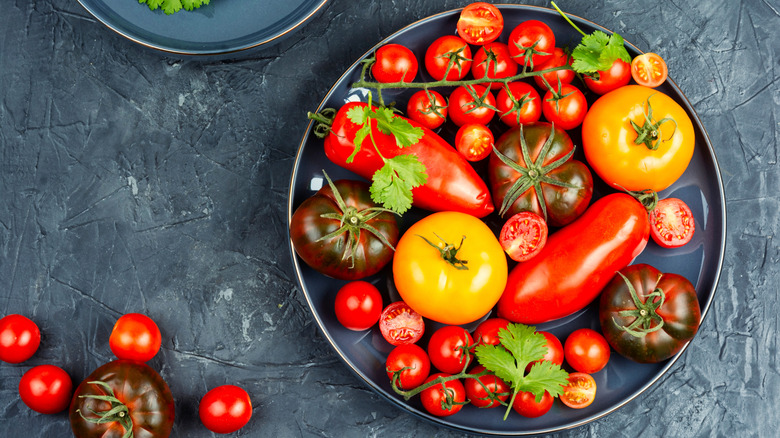 Top view of a platter with different types of tomatoes