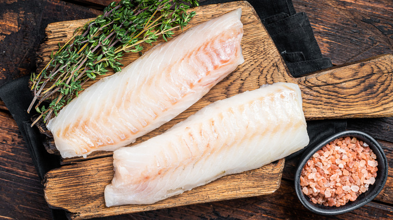 Fish fillets on a cutting board.