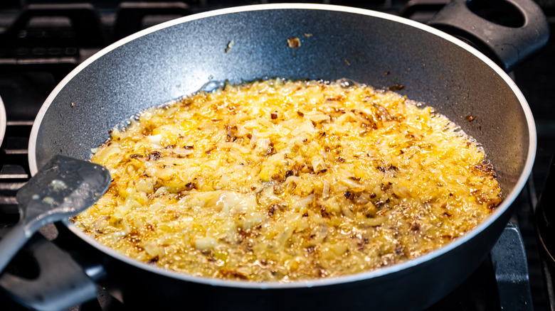 Caramelized onions cooking in non-stick pan