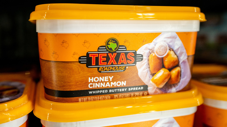 Texas Roadhouse Honey Cinnamon Butter on shelf at store retail food product grocery style spread display.