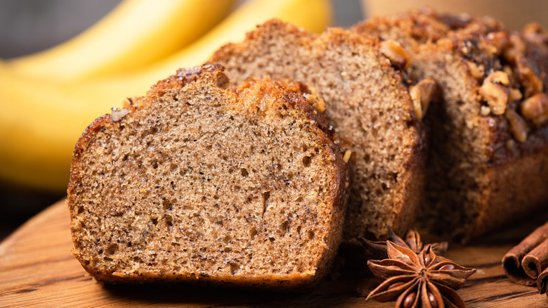 Slices of banana bread sitting on a cutting board