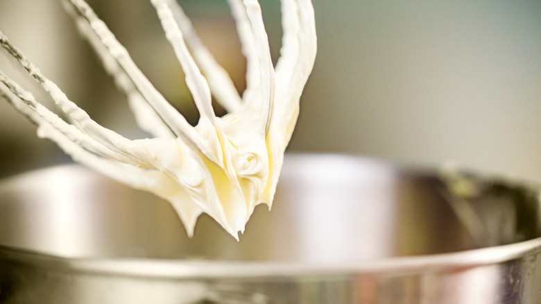 Cream cheese frosting on an electric whisk