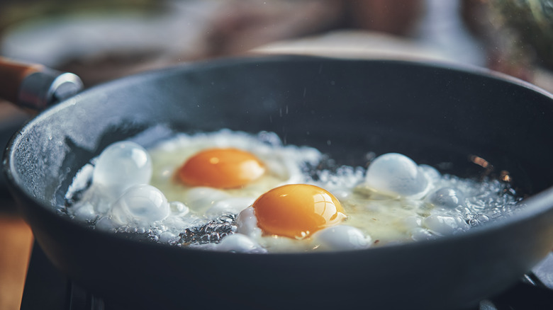 fried eggs in cast iron pan