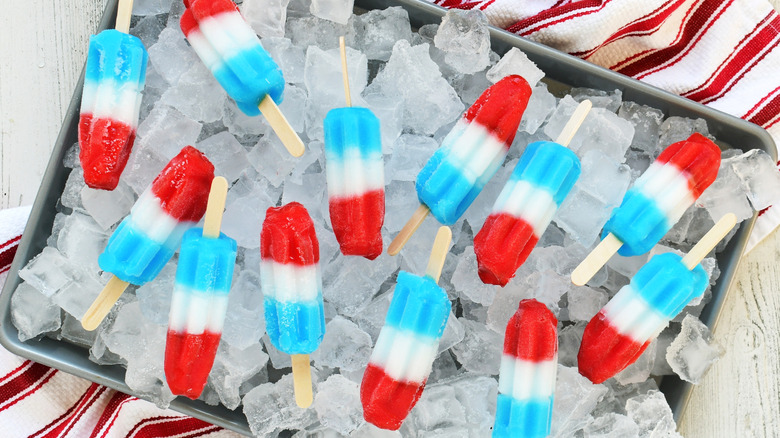 Red white and blue popsicles on ice