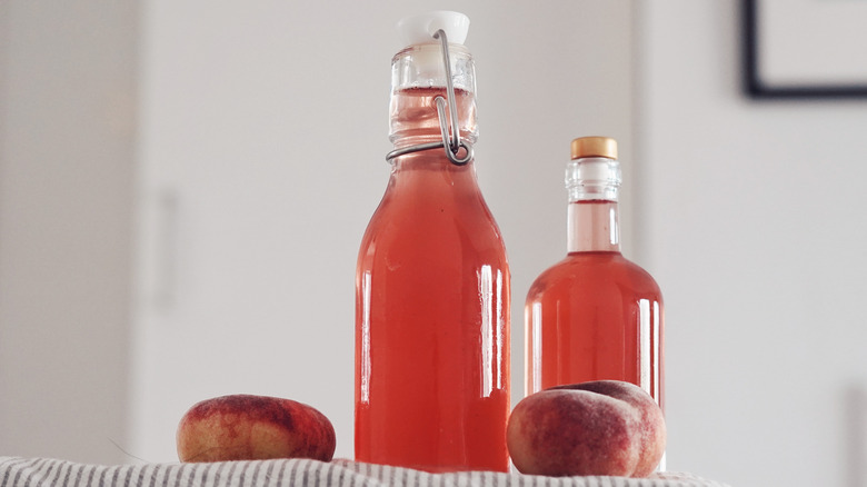 Bottles of peach simple syrup