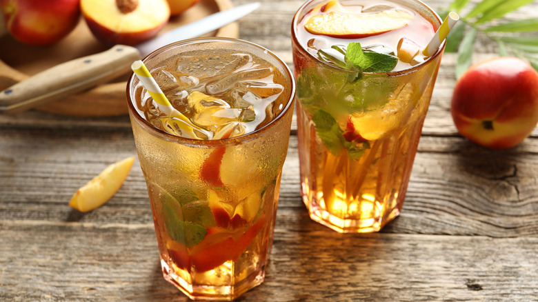 Two glasses of peach iced tea