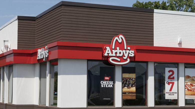 The exterior of an Arby's restaurant on a sunny day