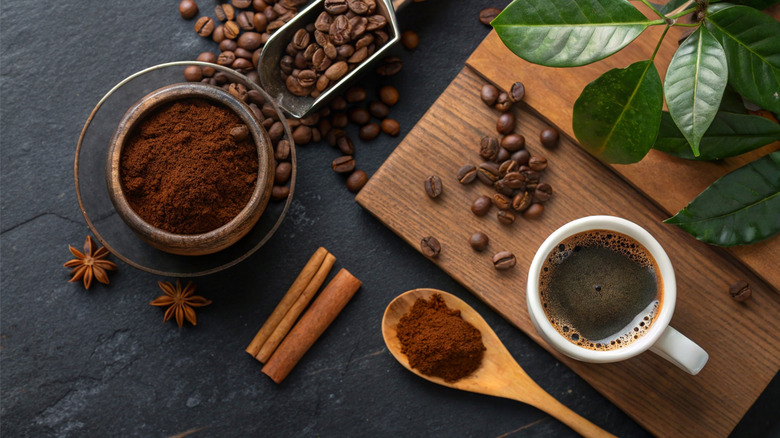 ground coffee beans with a cup of espresso