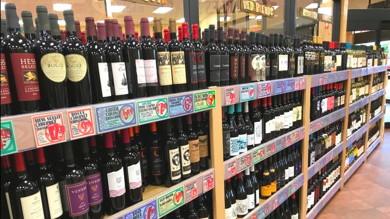 Trader Joe's wine section with shelves of wine bottles