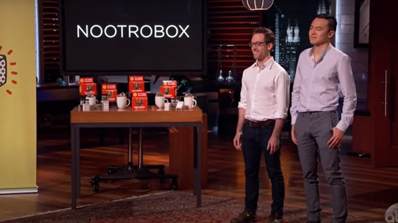 Michael Brandt and Geoffrey Woo next to their Nootropic Go Cubes display on Shark Tank
