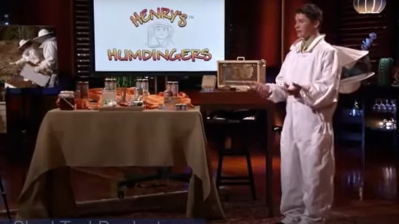 Henry Miller next to his Henry's Humdingers display on Shark Tank
