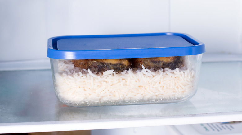 Rice in leftover container in fridge