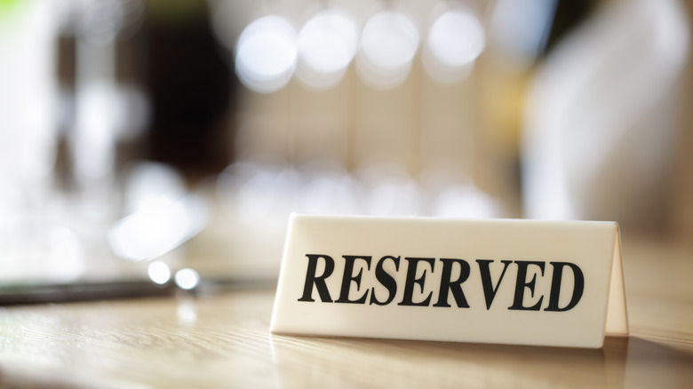 Aa reserved sign on a table