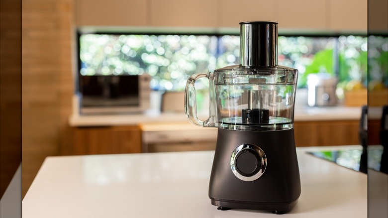 Food processor on a kitchen bench