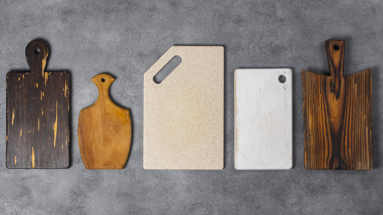 Various cutting boards on the table. Top view