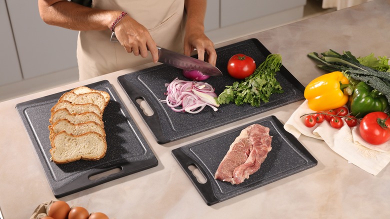 Separate boards for bread, veggies, and meat. Kitchen hygiene.