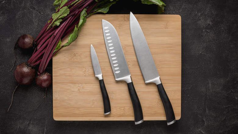 Kitchen Knives Set on Wood Cutting Board