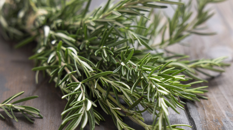 Fresh rosemary on a wood table