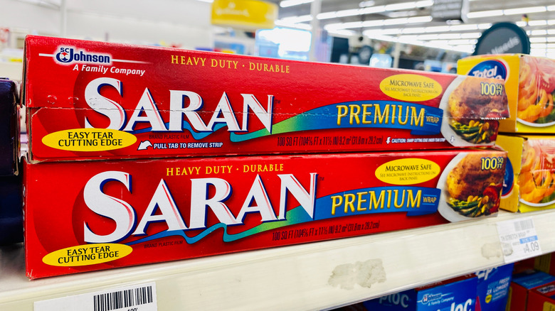 Two boxes of Saran wrap on a store shelf