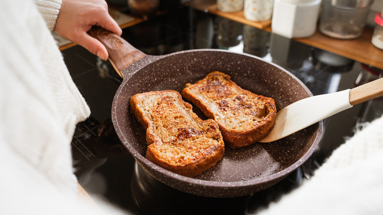 French toast being cooked in a nonstick pan
