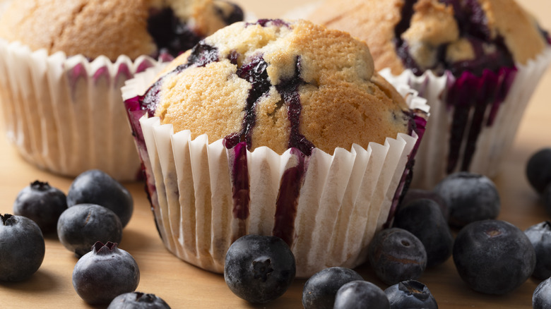 Close-up shot of blueberries in blueberry muffins