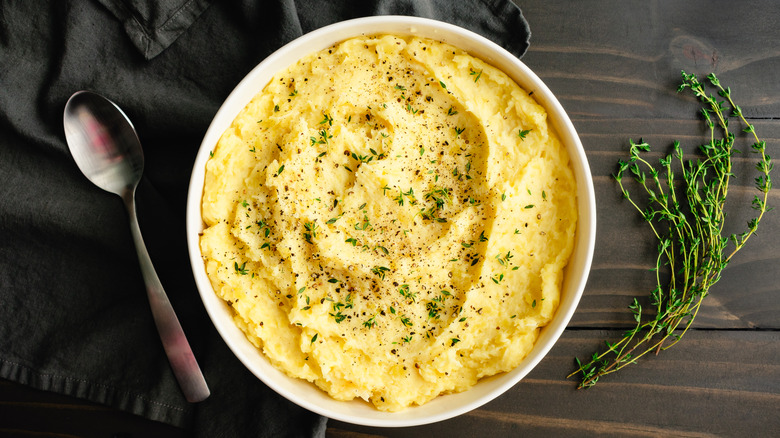 bowl of mashed potatoes with garnish