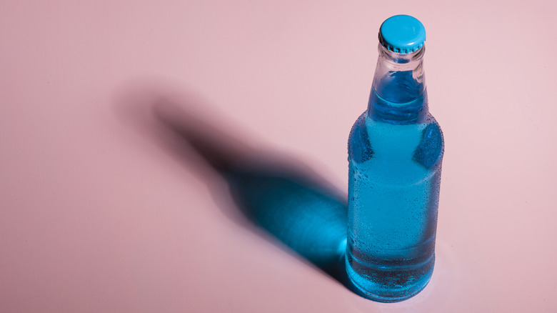 Blue craft soda in glass bottle
