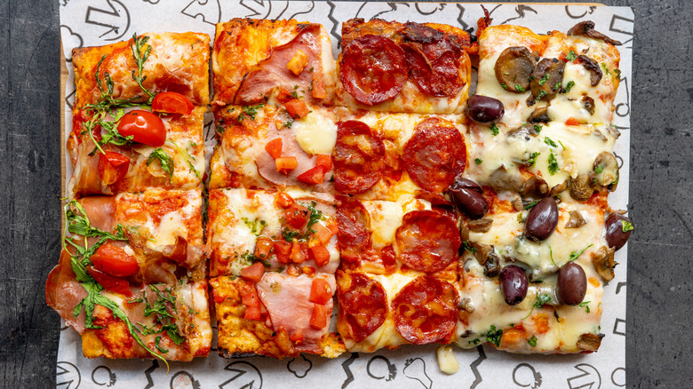 A pizza with multiple topping options
