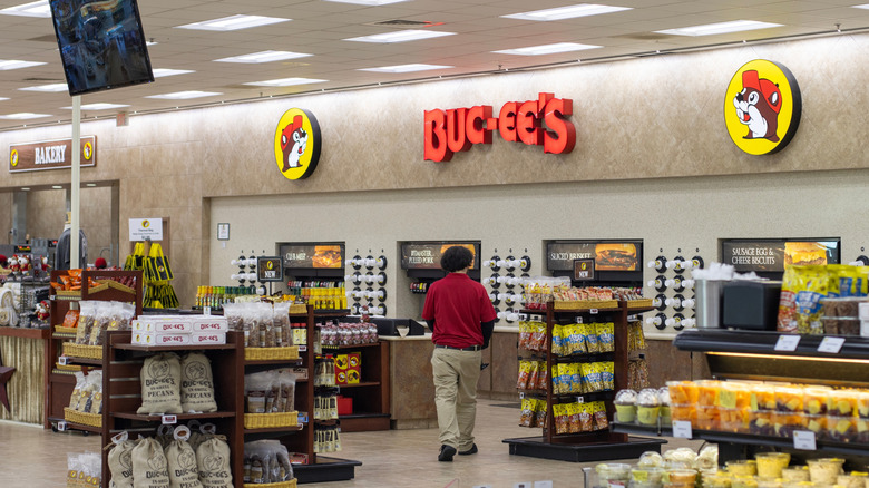 The inside of a Buc-ee's location with an employee walking in it