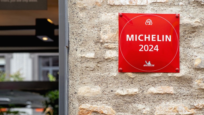 A Michelin sign outside a well-regarded restaurant.