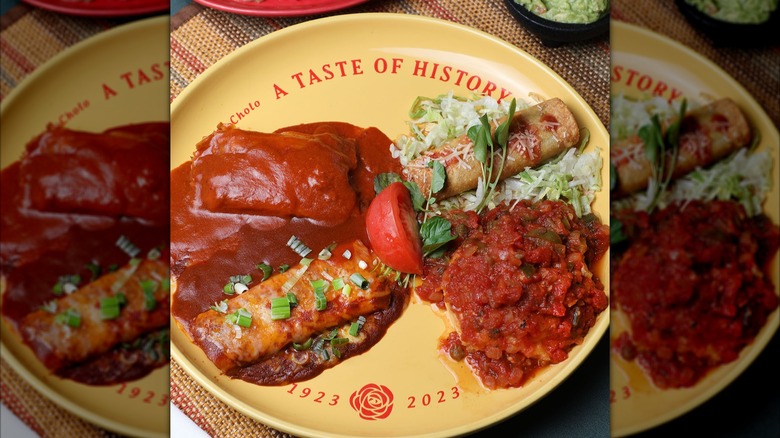 Yellow plate of various Mexican foods
