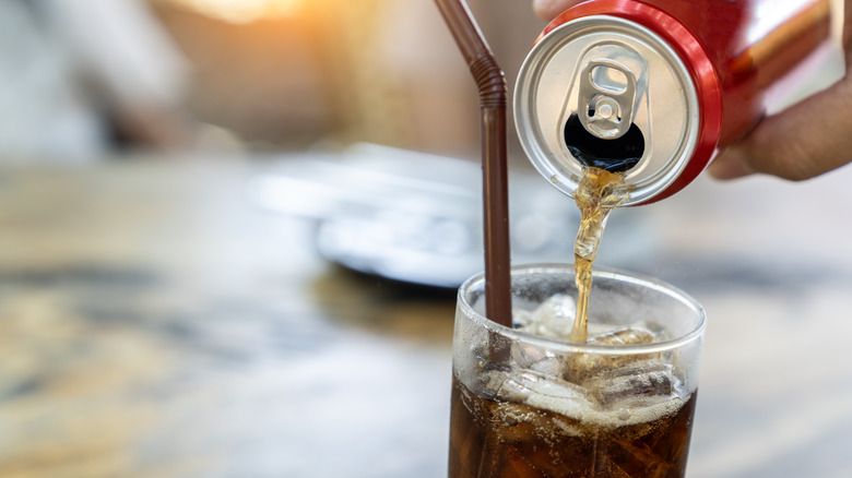 Soda pour into a glass
