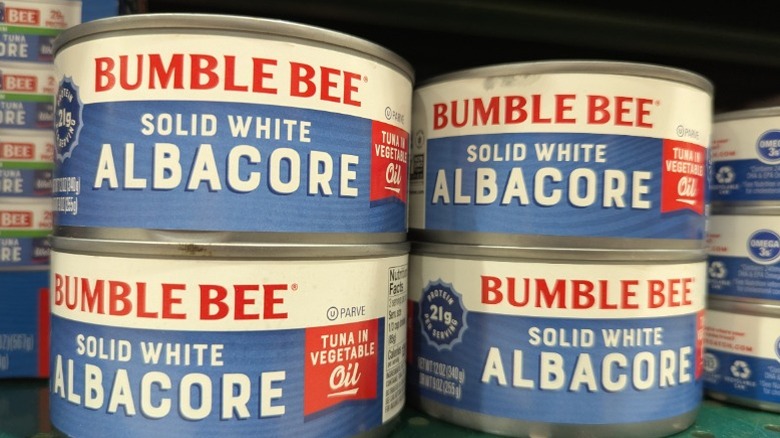 Canned Bumble Bee tuna on a supermarket shelf
