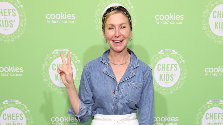 Christina Tosi flashing a peace sign
