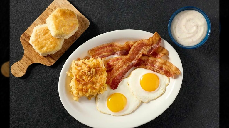 The Old Timers Breakfast from Cracker Barrel laid out on a black surface