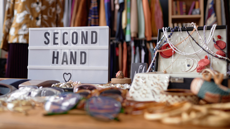 A variety of accessories on display at a secondhand store