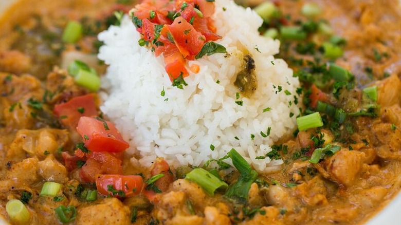 Bowl of white chicken chili with rice