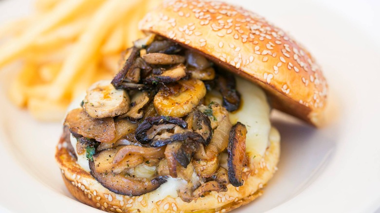 Burger stacked with mushrooms