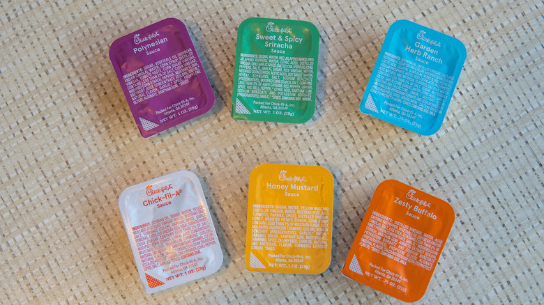 An assortment of Chick-fil-A dipping sauces laid out