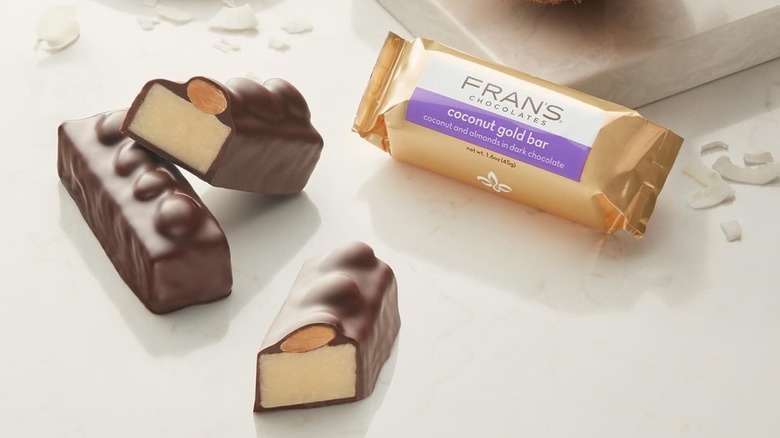 Fran's Chocolates Coconut Gold Bars with almonds an coconut flakes