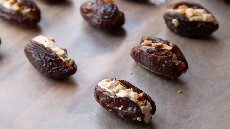 Medjool dates with nougat filling and chopped nuts