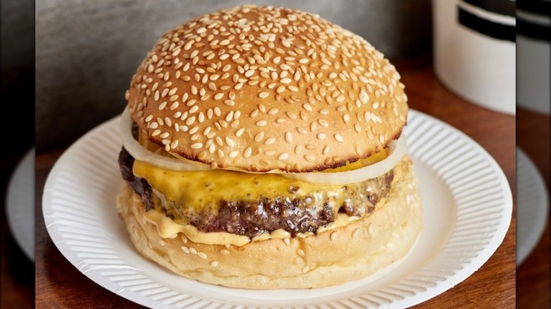 cheeseburger from Bleecker on a white paper plate