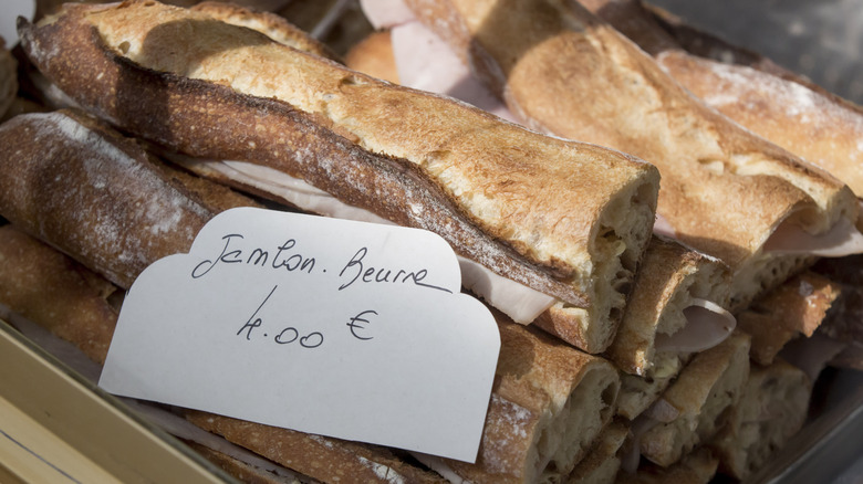 French ham and butter sandwiches on display with price