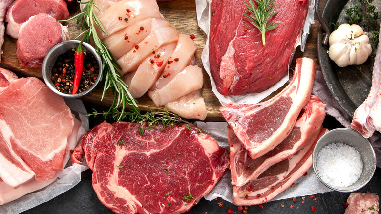 Different types of raw meat including chicken, beef, pork, and lamb
