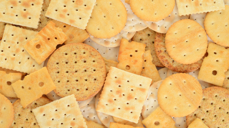 pile of assorted crackers including butter and saltine