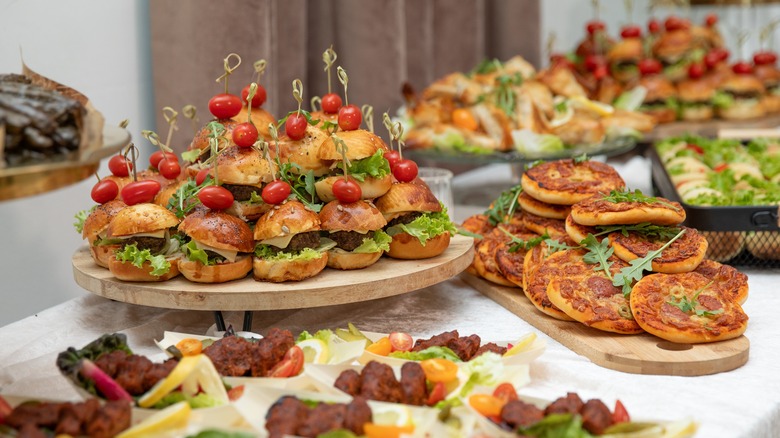 A table full of finger foods and appetizers