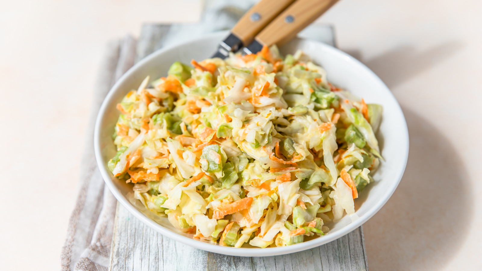 The Coleslaw Ingredient You Just Need A Half Teaspoon Of For An Unbeatable Flavor Boost