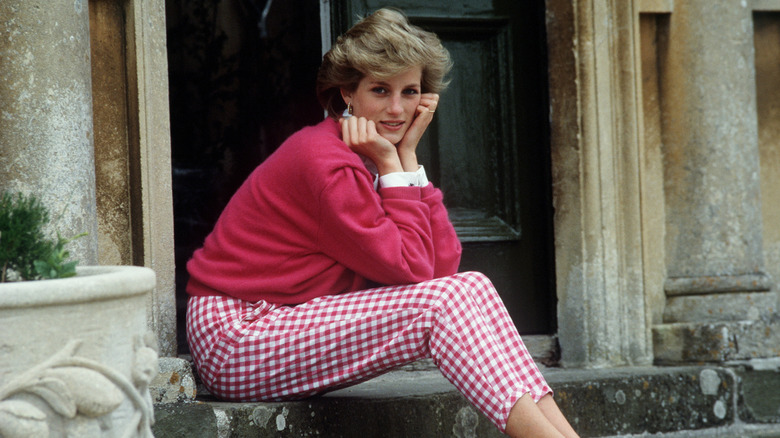 Princess Diana sitting on stairs